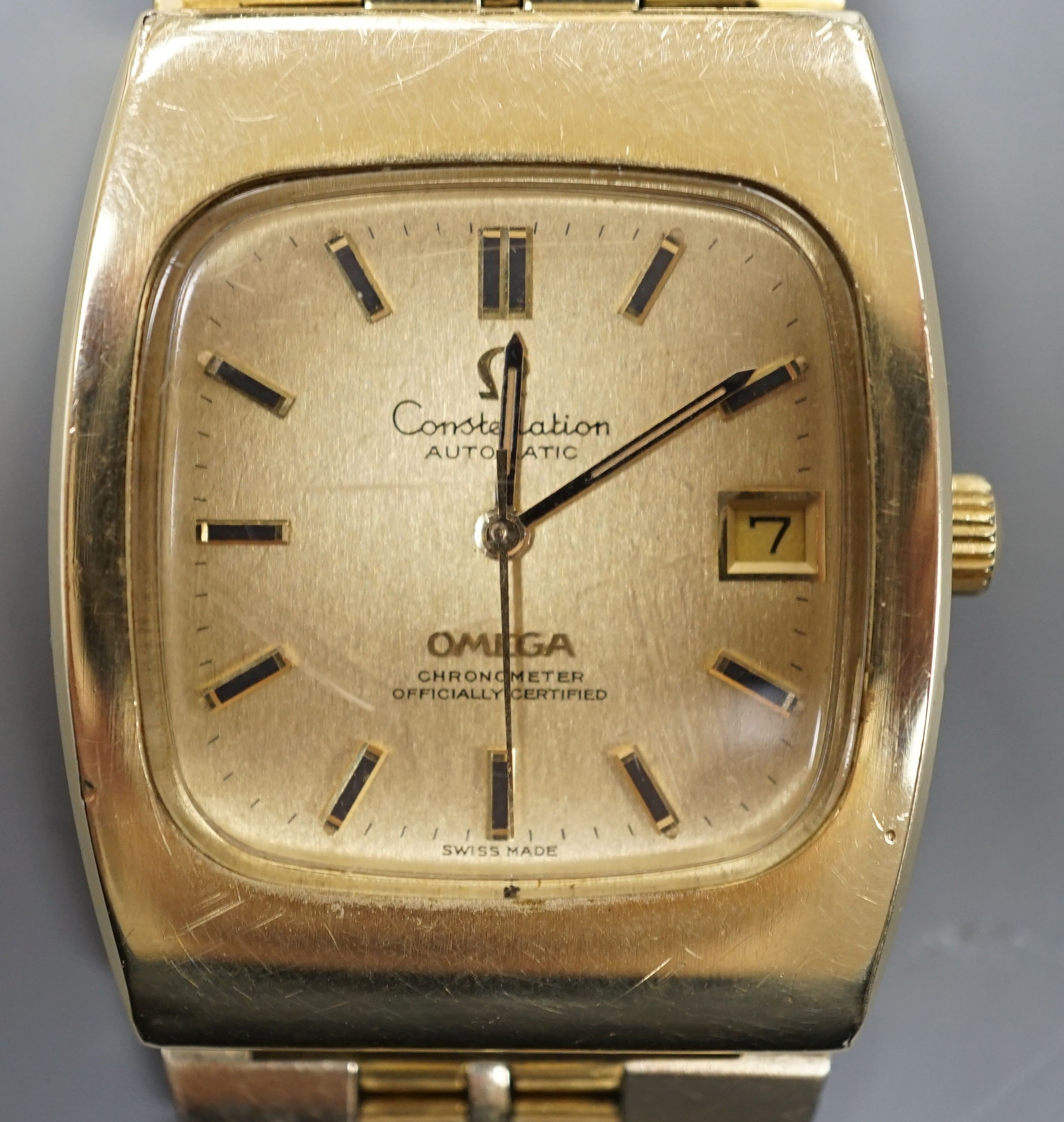 A gentleman's steel and gold plated Omega Constellation automatic wrist watch, on a steel and gold plated Omega bracelet, case diameter 34mm, no box or papers.